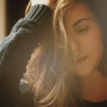 Can Bed Bugs Live In Human Hair-woman-scratching-hair